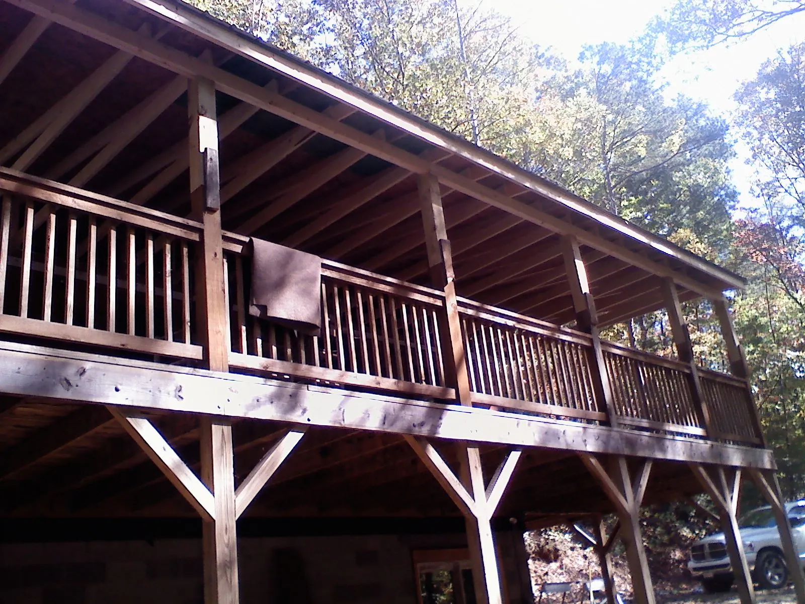 Timber framing under a new elevated porch and deck — Roof Leak Repair in Mountain Home by Roofing Brothers